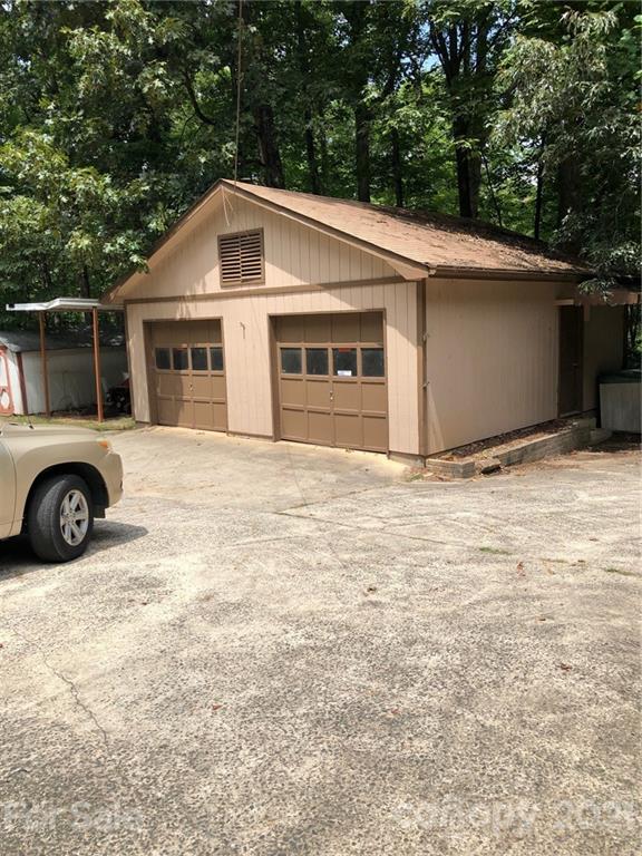 4797 Asbury Church Road Lincolnton, NC 28092 - Photo 6 of 19 a front view of a house with a yard