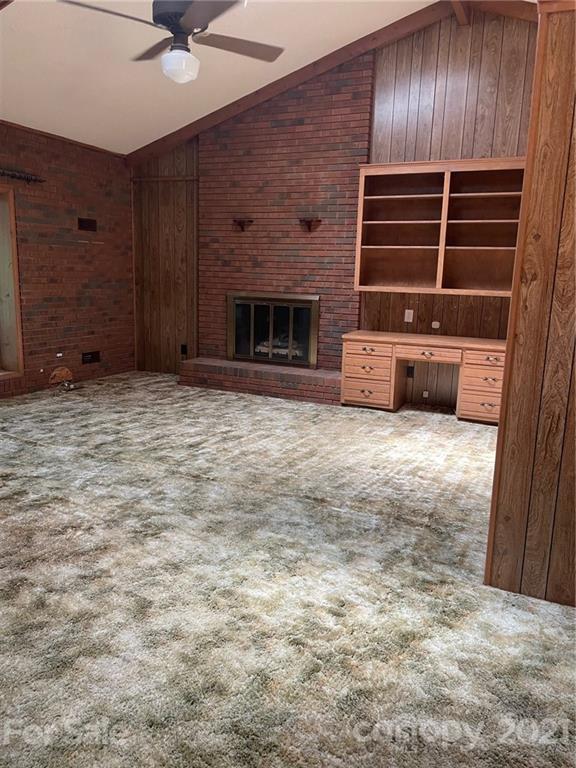 4797 Asbury Church Road Lincolnton, NC 28092 - Photo 7 of 19 a view of an empty room with a fireplace