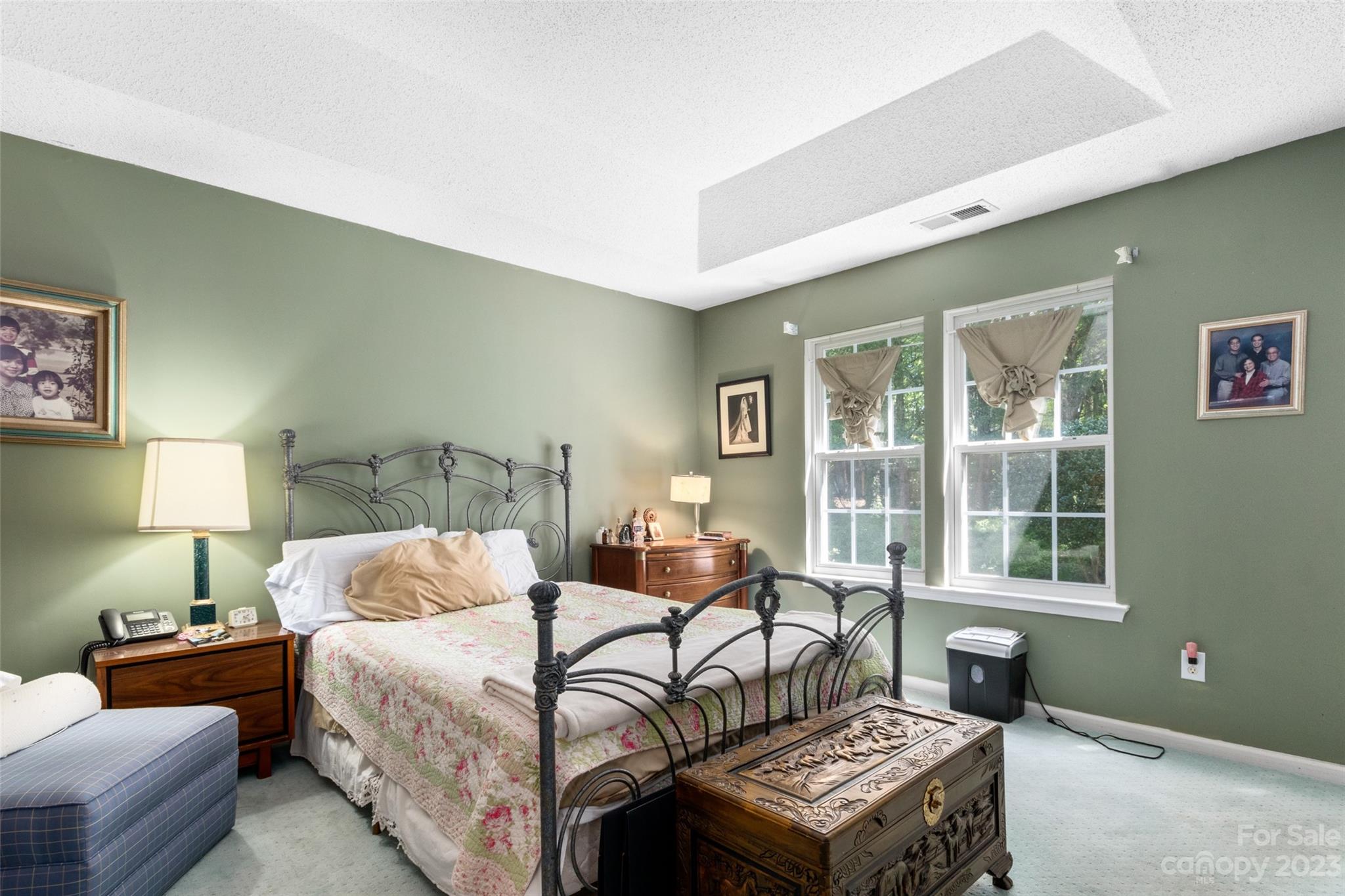 912 Cadogan Court Fort Mill, SC 29708 - Photo 9 of 26 a bedroom with a bed and wooden floor