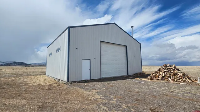 a view of a livingroom with wooden floor