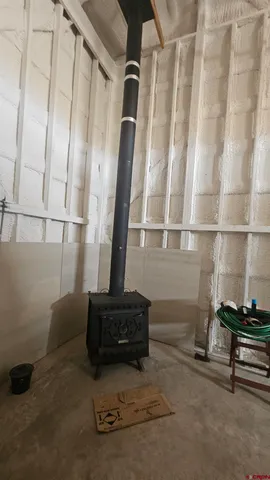 a bathroom with a shower and a sink