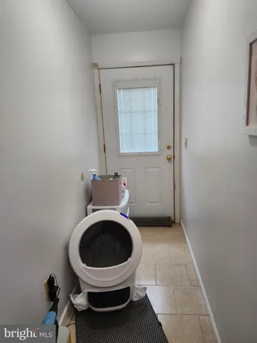 a bathroom with a toilet and a sink