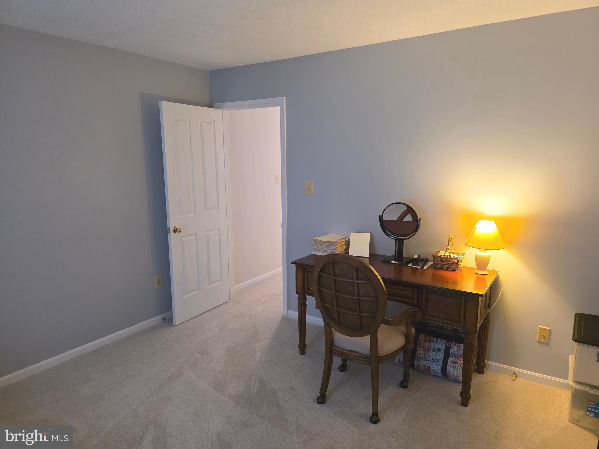 2441 Kemper Road Crofton, MD 21114 - Photo 39 of 63 a room with a table and chairs