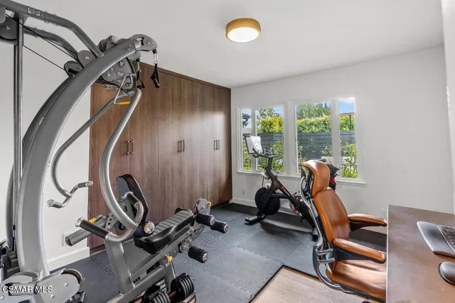 a view of a room with gym equipment