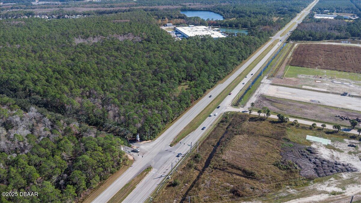 10090 U.S. Rte 1 Ormond Beach, FL 32174 - Photo 13 of 38 a view of a yard with an outdoor space