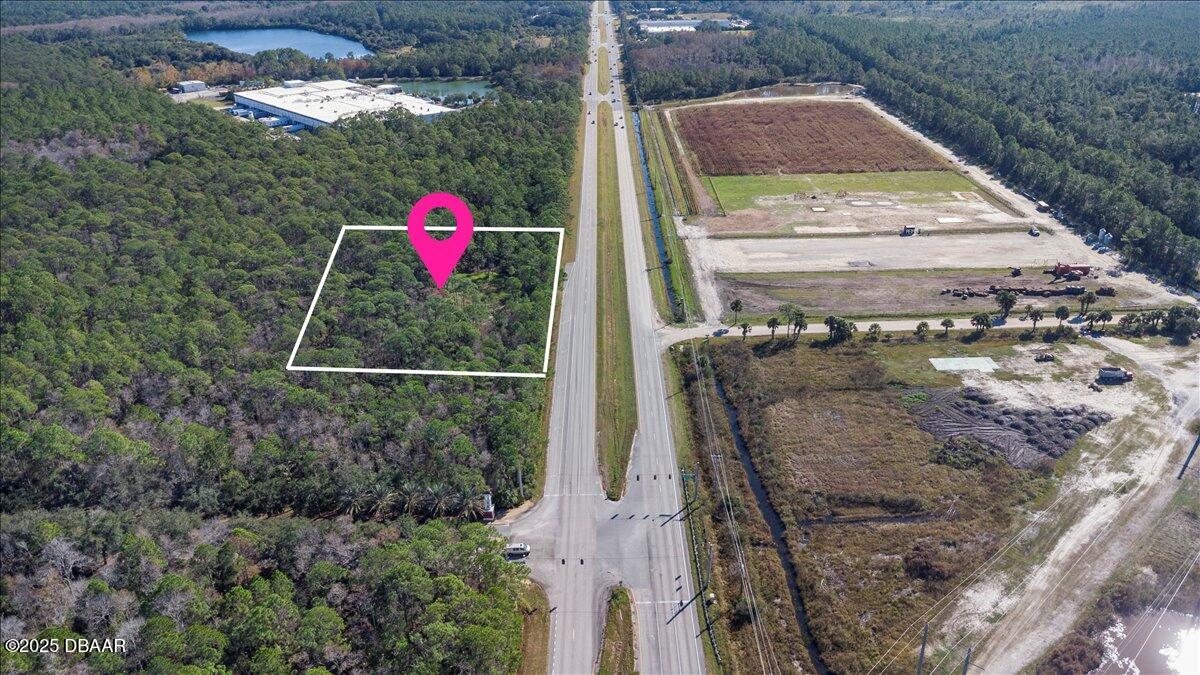 10090 U.S. Rte 1 Ormond Beach, FL 32174 - Photo 14 of 38 a aerial view of a house