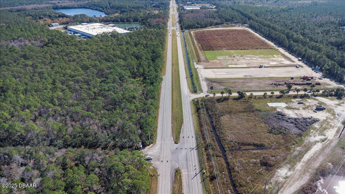 10090 U.S. Rte 1 Ormond Beach, FL 32174 - Photo 15 of 38 a bird view of a house