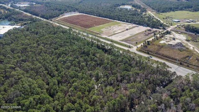 an aerial view of a backyard