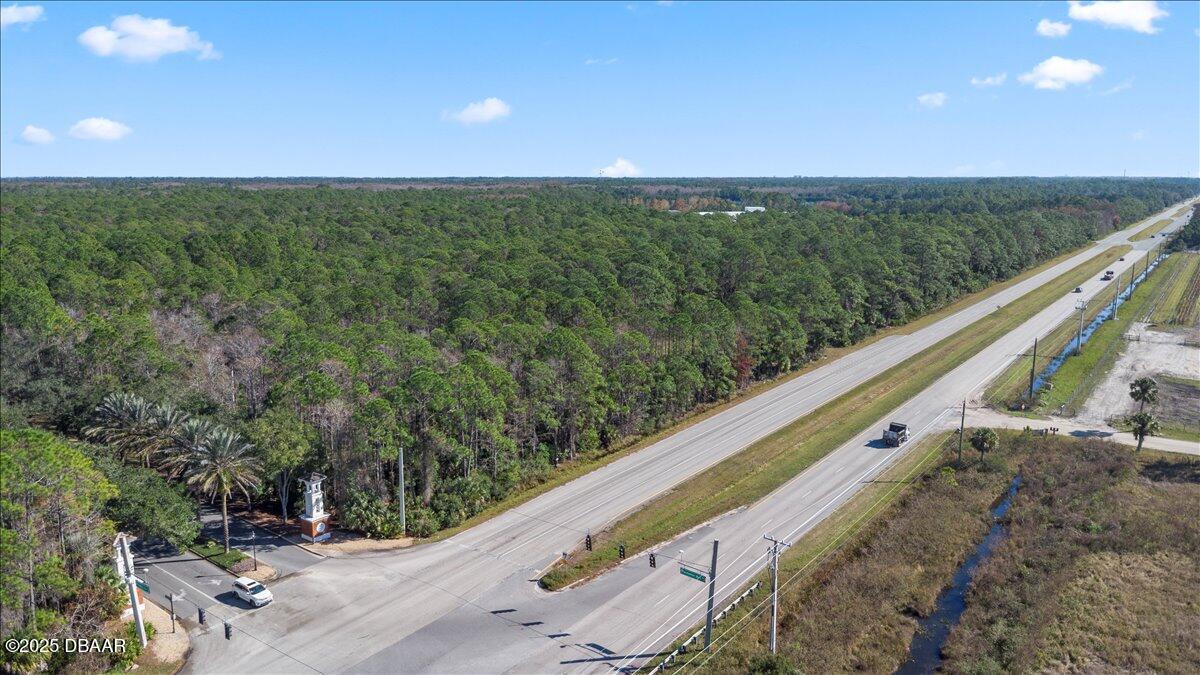 10090 U.S. Rte 1 Ormond Beach, FL 32174 - Photo 38 of 38 a view of a field with a tree