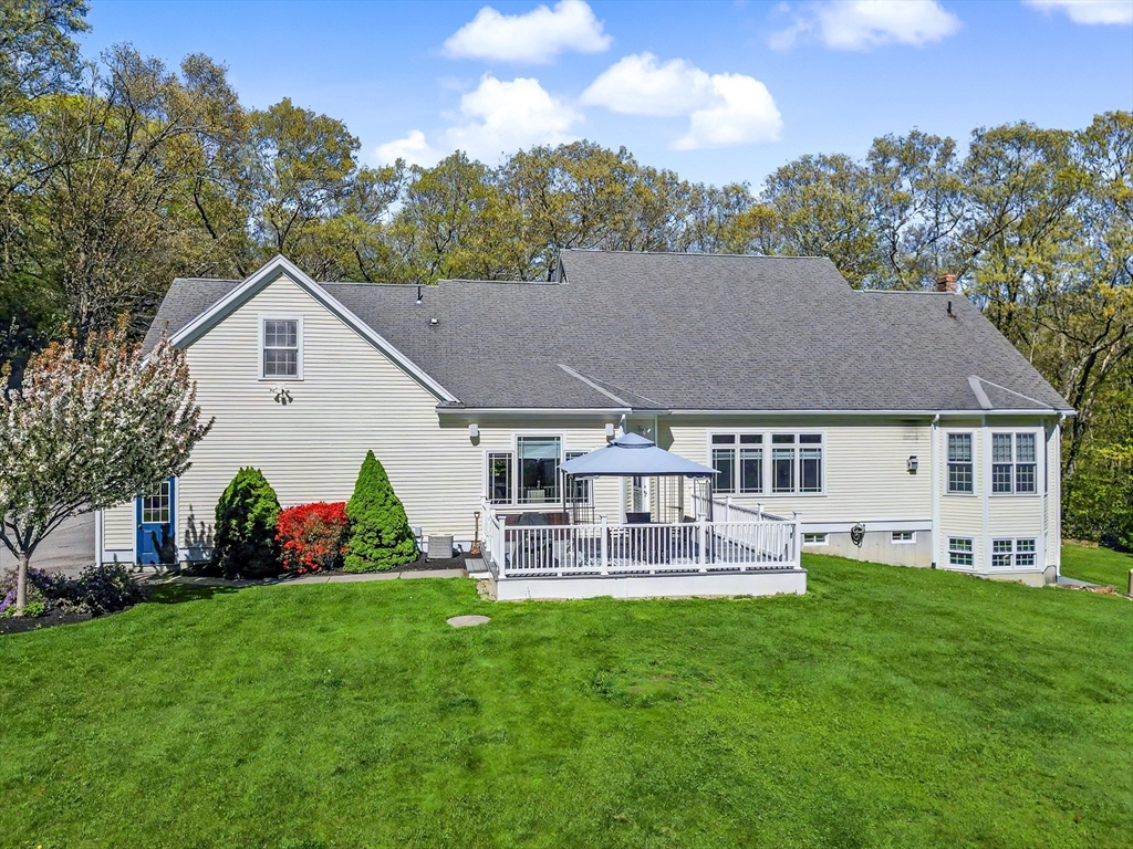 270 Mendon Road Sutton, MA 01590 - Photo 4 of 42 a front view of house with yard and outdoor seating
