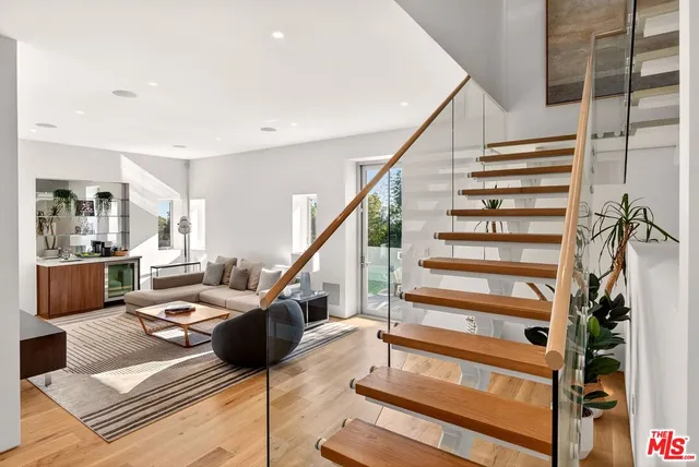 a view of a balcony with chairs