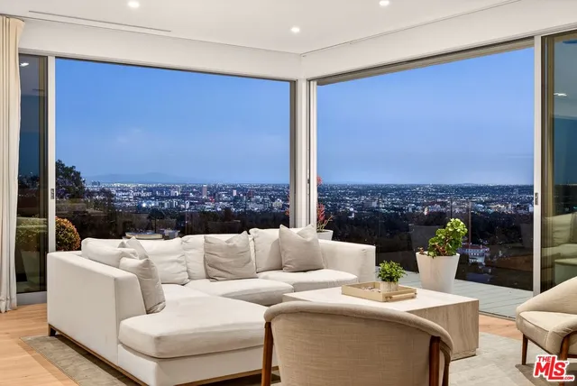 a view of a balcony with chairs