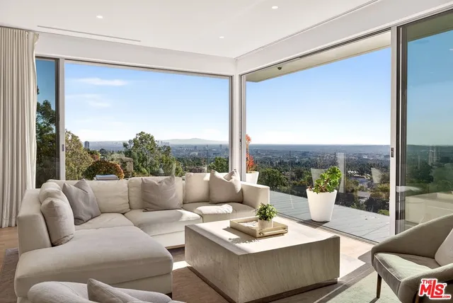a view of a balcony with couches