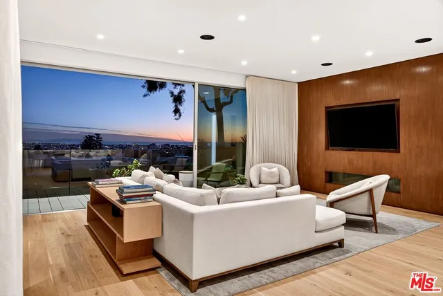 a view of a balcony with chairs