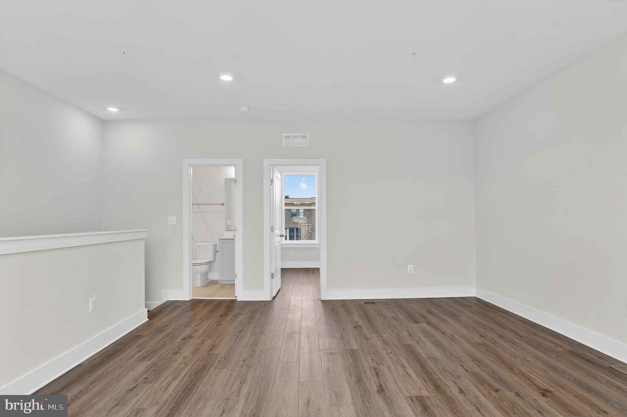 2710 Light Street Baltimore, MD 21230 - Photo 19 of 24 a view of empty room with wooden floor