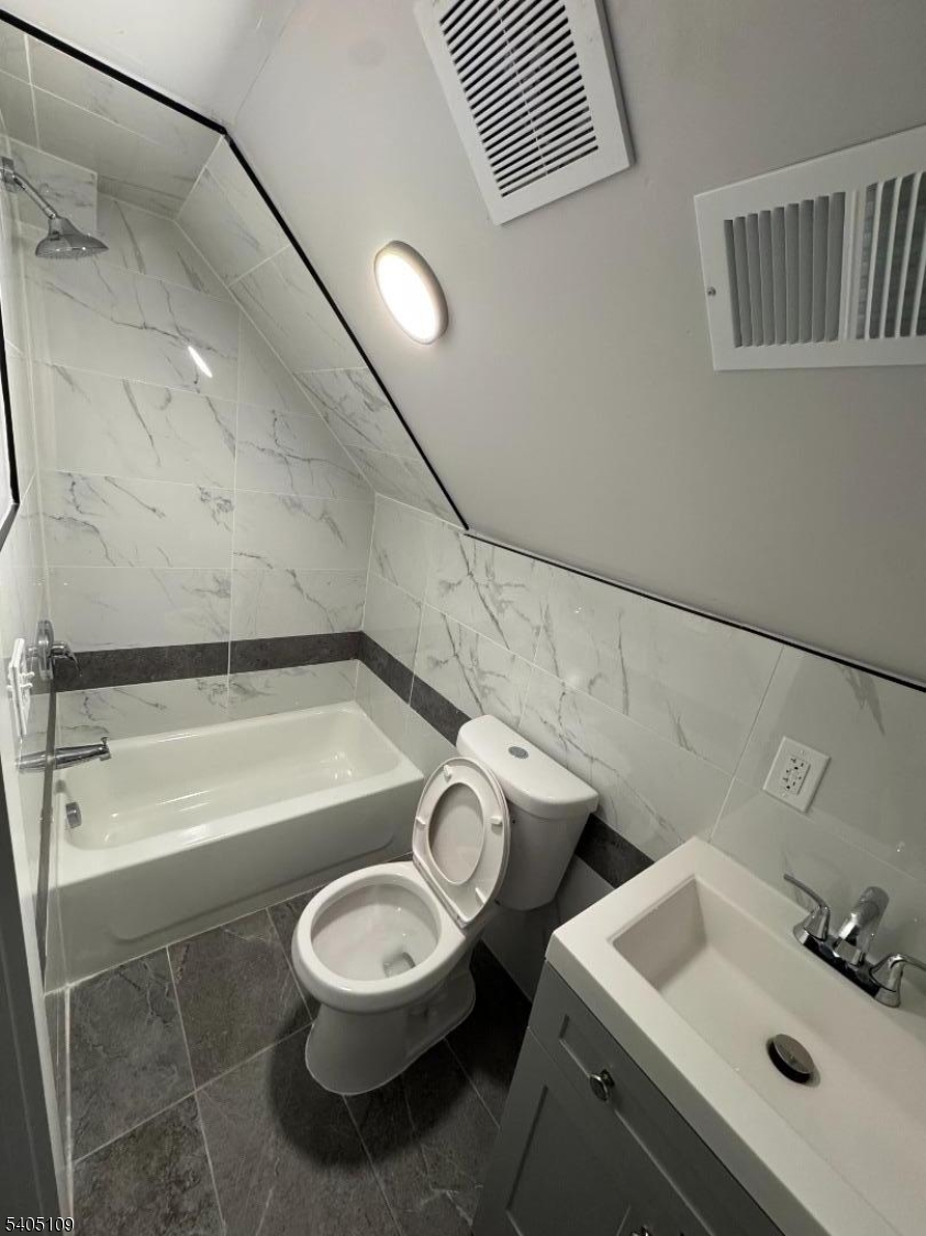 859 South 16th Street, Unit 2 Newark, NJ 07108 - Photo 6 of 14 a bathroom with a sink and a mirror