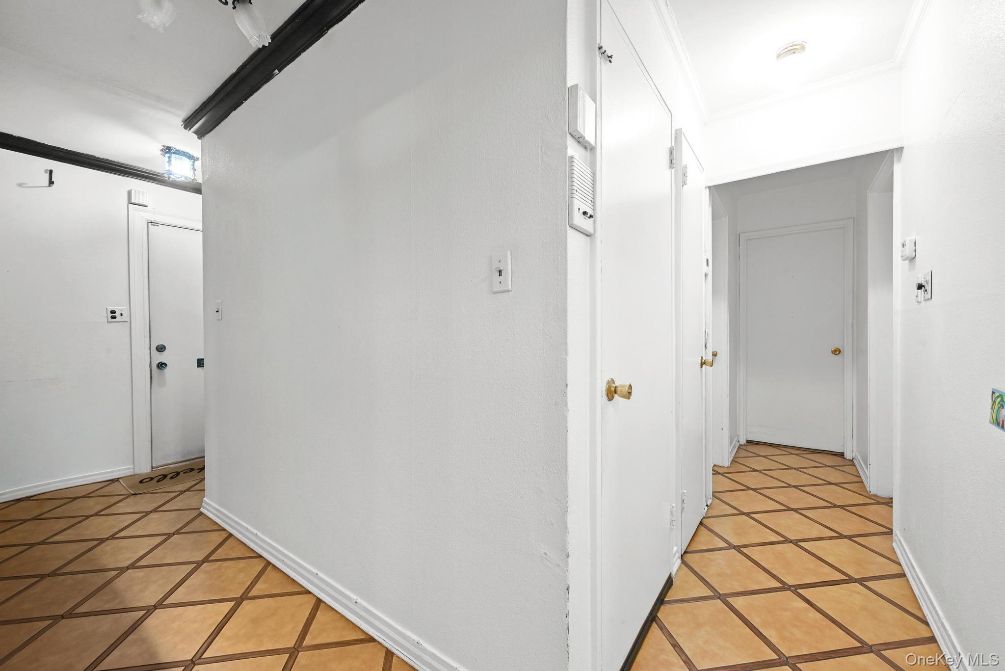 2225 Leighton Road Elmont, NY 11003 - Photo 18 of 26 a bathroom with a sink and a shower