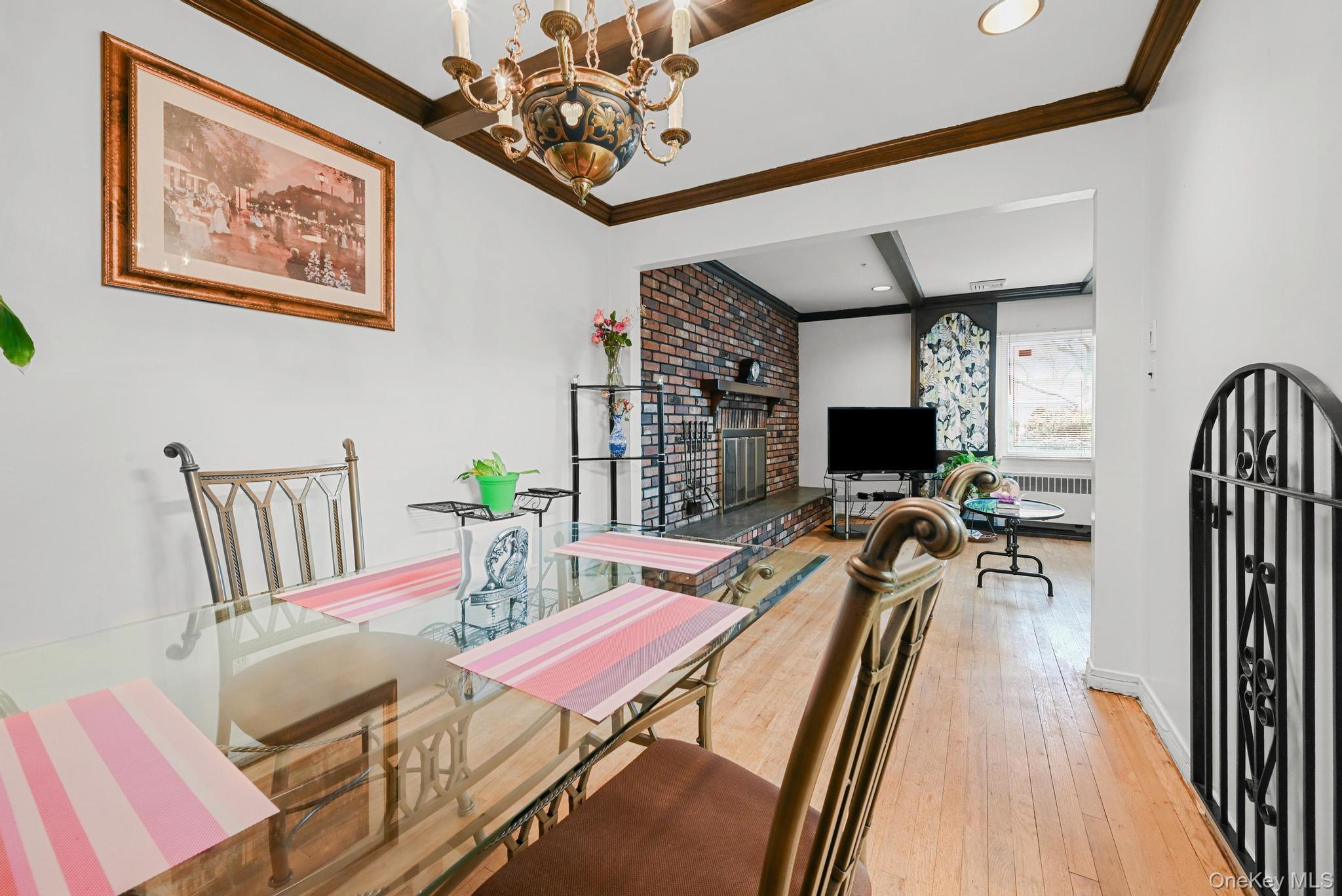 2225 Leighton Road Elmont, NY 11003 - Photo 10 of 26 a view of a dining room with furniture and wooden floor