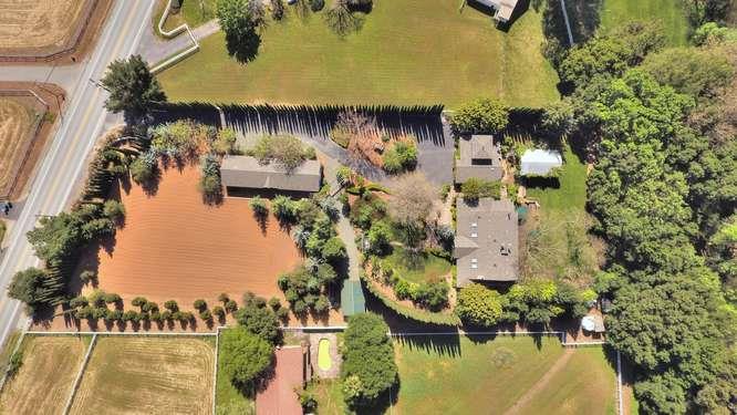 12455 Watsonville Road Gilroy, CA 95020 - Photo 2 of 49 an aerial view of residential houses with outdoor space