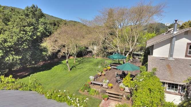 12455 Watsonville Road Gilroy, CA 95020 - Photo 8 of 49 a view of a garden with large trees