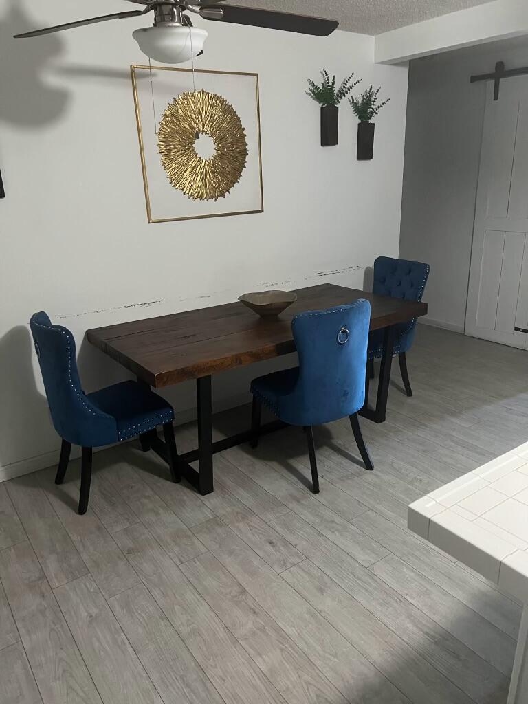 66630 San Marcus Road Desert Hot Springs, CA 92240 - Photo 2 of 5 a workspace with furniture and rug