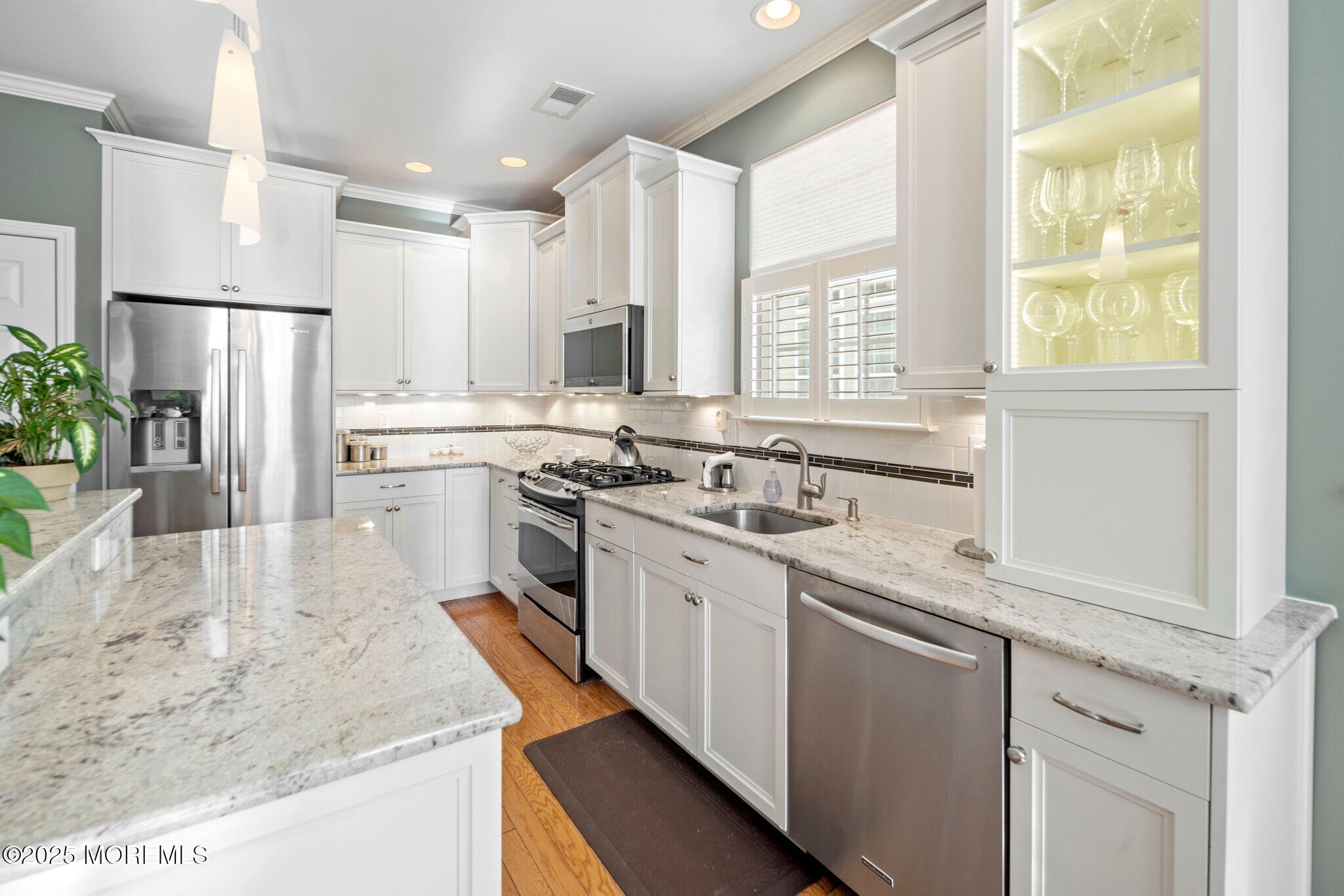 87 Pond View Circle Barnegat, NJ 08005 - Photo 18 of 66 a kitchen with stainless steel appliances granite countertop a sink stove and refrigerator