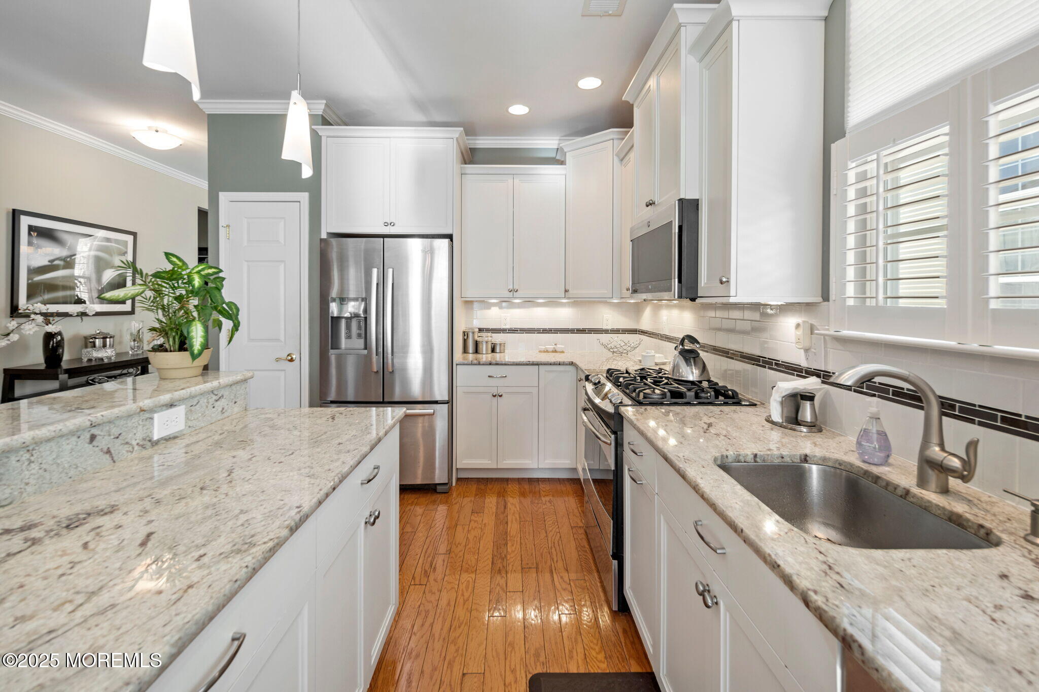 87 Pond View Circle Barnegat, NJ 08005 - Photo 20 of 66 a kitchen with stainless steel appliances granite countertop a sink stove and refrigerator