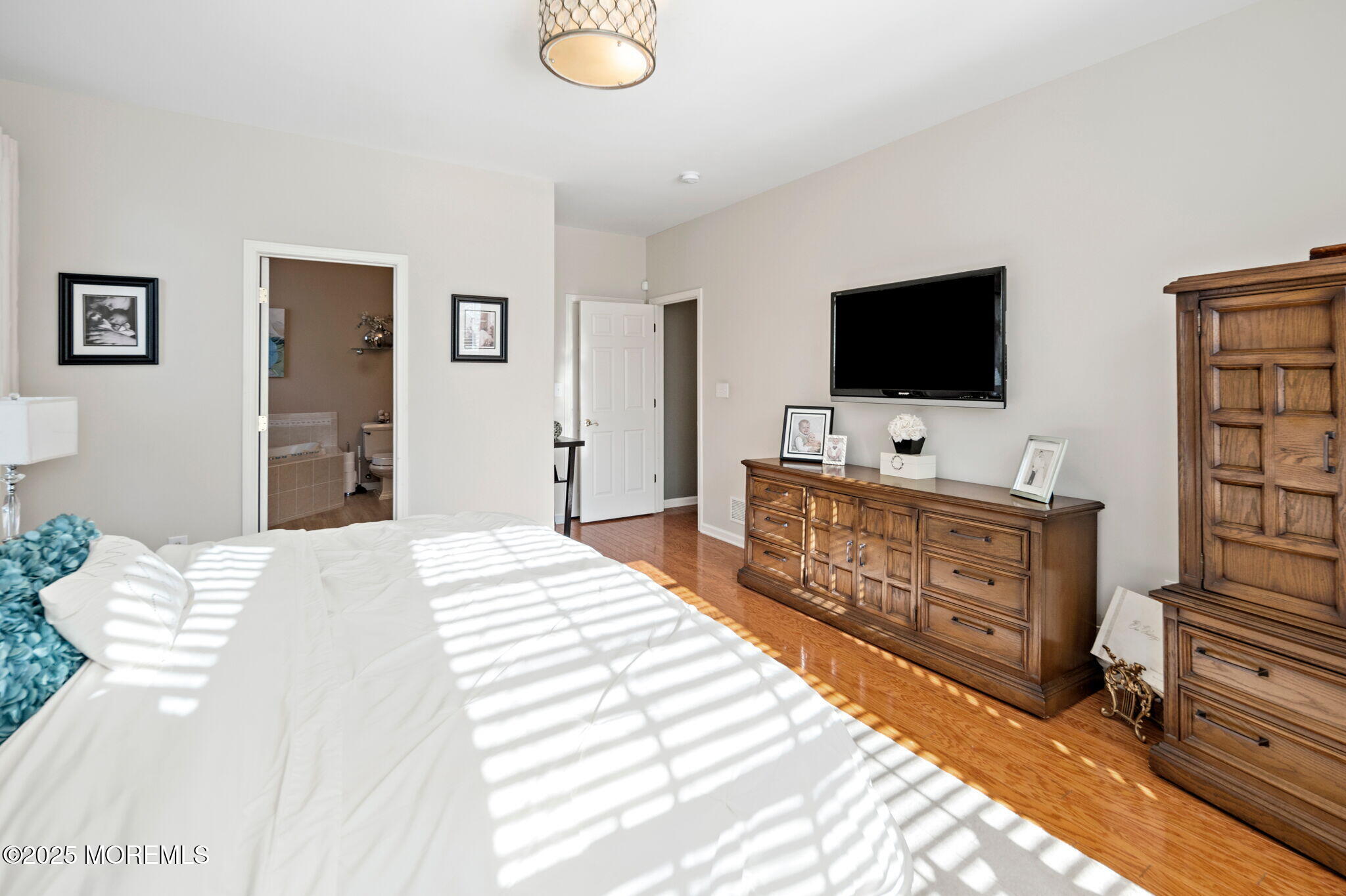 87 Pond View Circle Barnegat, NJ 08005 - Photo 35 of 66 a bedroom with a bed and flat screen tv