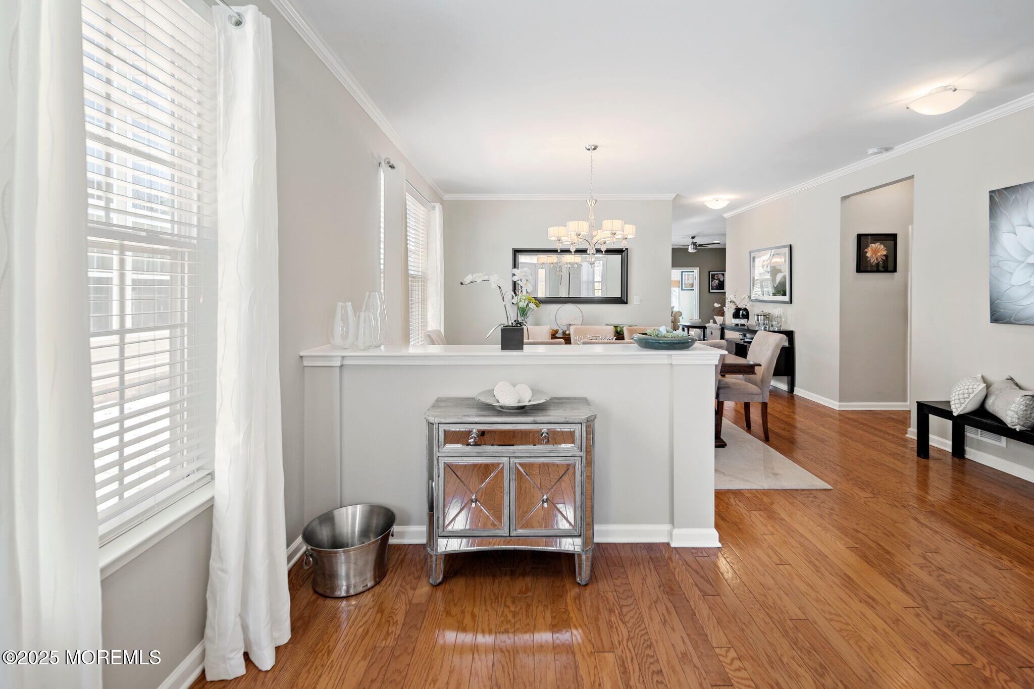 87 Pond View Circle Barnegat, NJ 08005 - Photo 4 of 66 a living room with stainless steel appliances furniture and a wooden floor