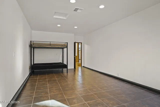 a view of a balcony with wooden fence and floor