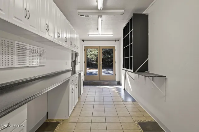 a view of a balcony with wooden floor and fence