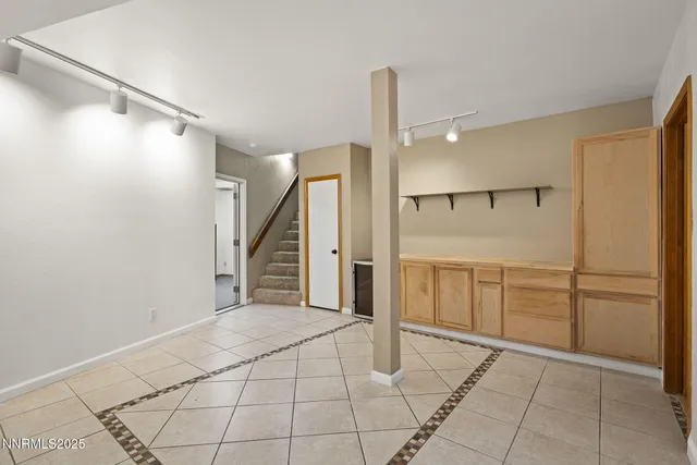 a view of swimming pool with lounge chair