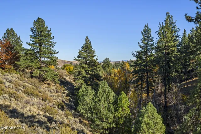 a view of yard with swimming pool and outdoor seating