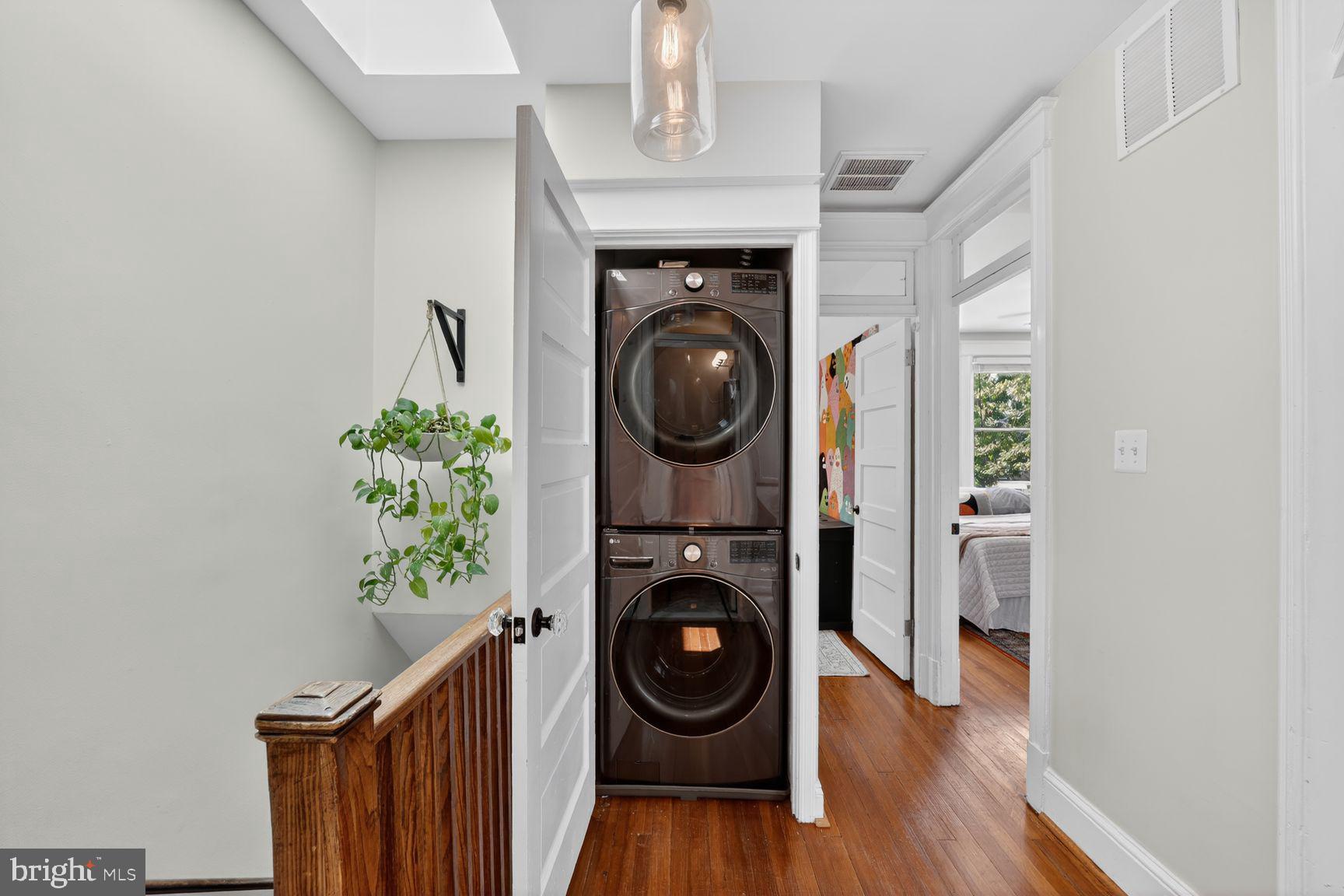 309 Webster Street Northwest Washington, DC 20011 - Photo 22 of 49 Sleek laundry nook with modern appliances.