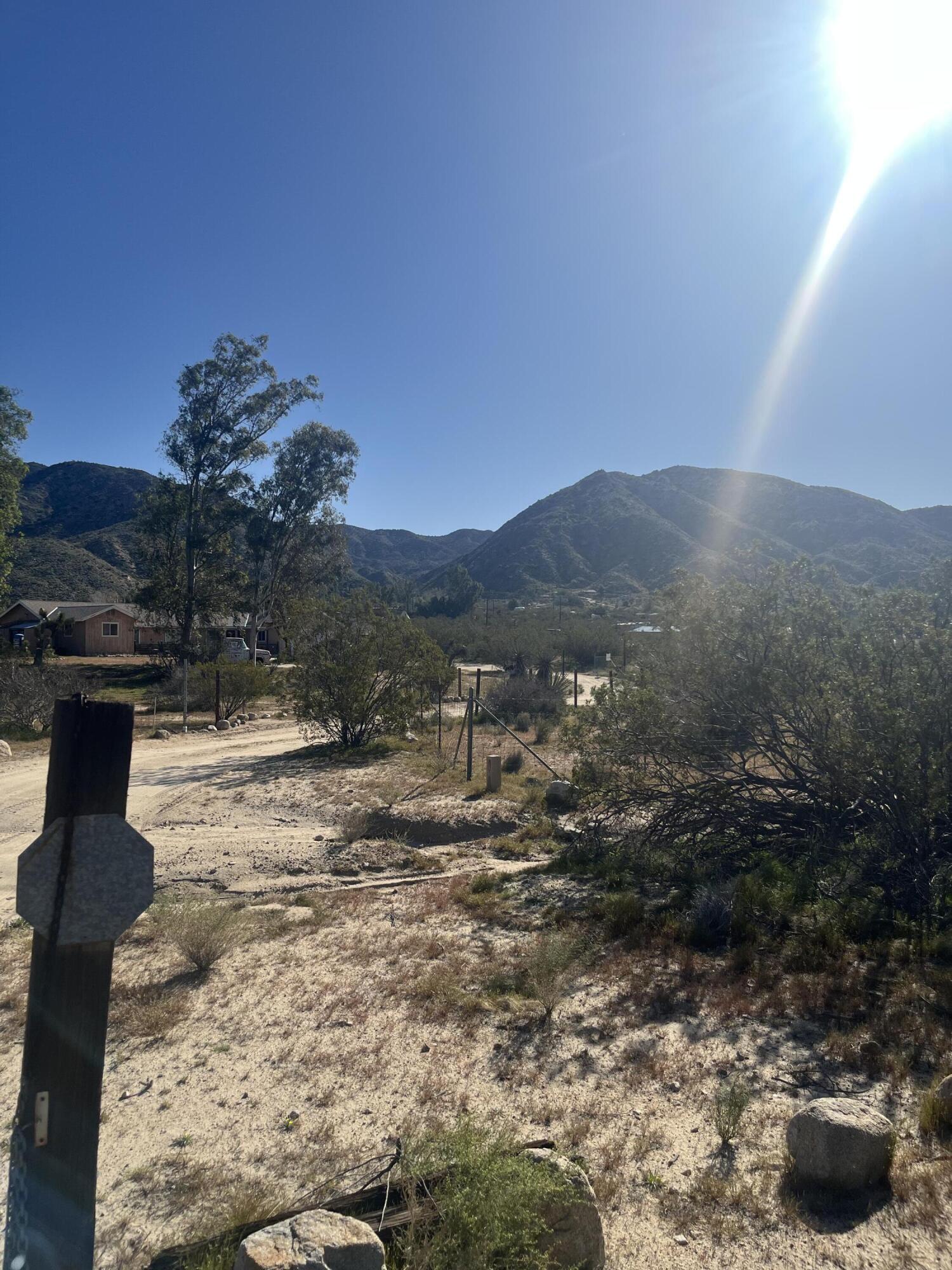 0 Belden Avenue Morongo Valley, CA 92256 - Photo 3 of 7 a view of a backyard with wooden fence