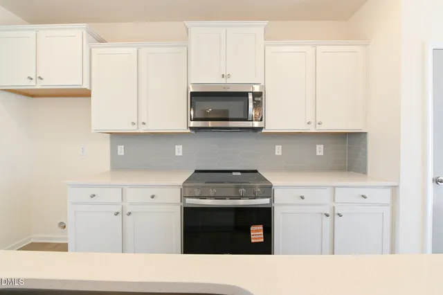 a living room with furniture fireplace and a flat screen tv