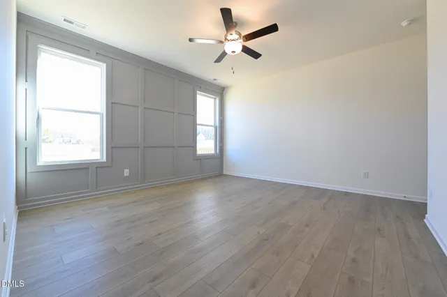 a bathroom with a sink a mirror and a bathtub
