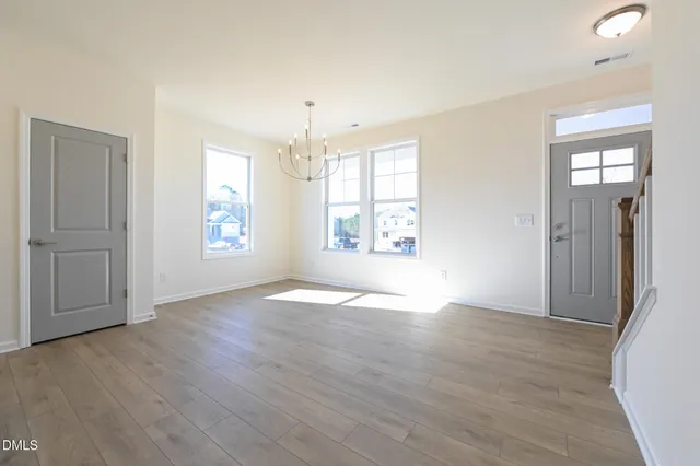 a view of livingroom with hardwood floor and window