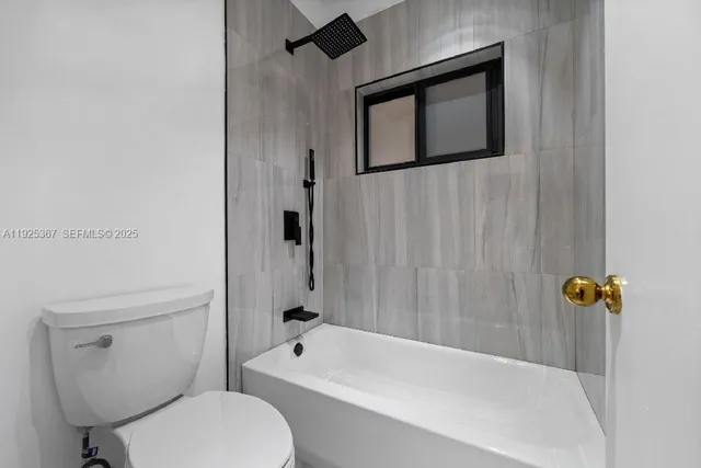 a swimming pool with outdoor seating and yard