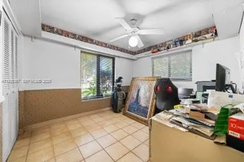 a bathroom with a bathtub sink vanity and mirror