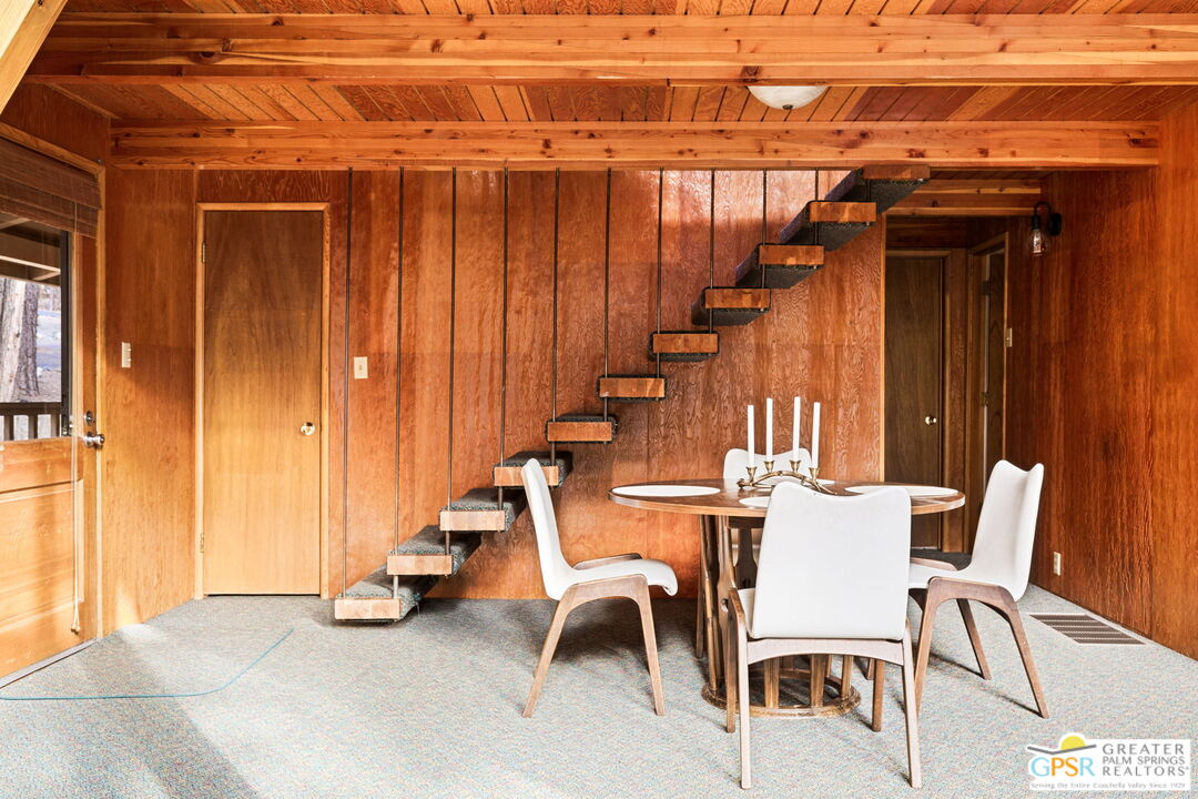 24601 Fern Valley Road Idyllwild, CA 92549 - Photo 13 of 50 a view of a patio with table and chairs