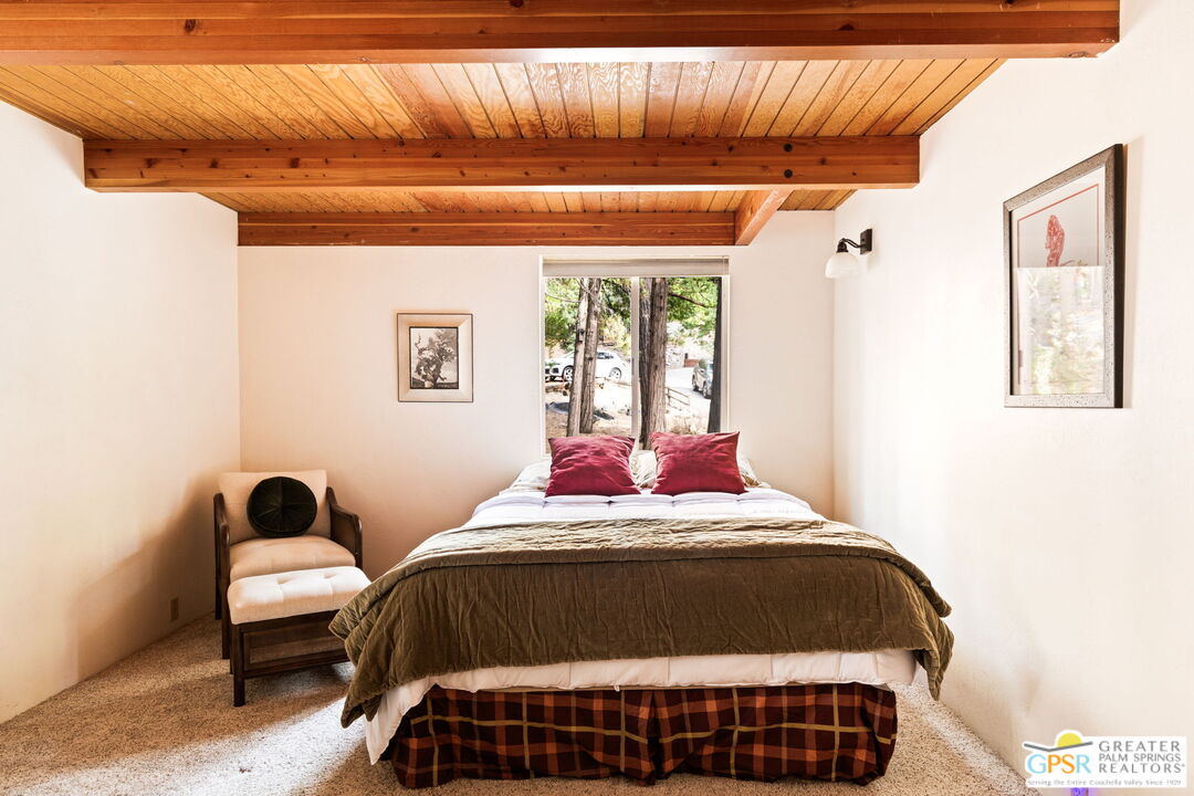 24601 Fern Valley Road Idyllwild, CA 92549 - Photo 31 of 50 a bedroom with a bed and window