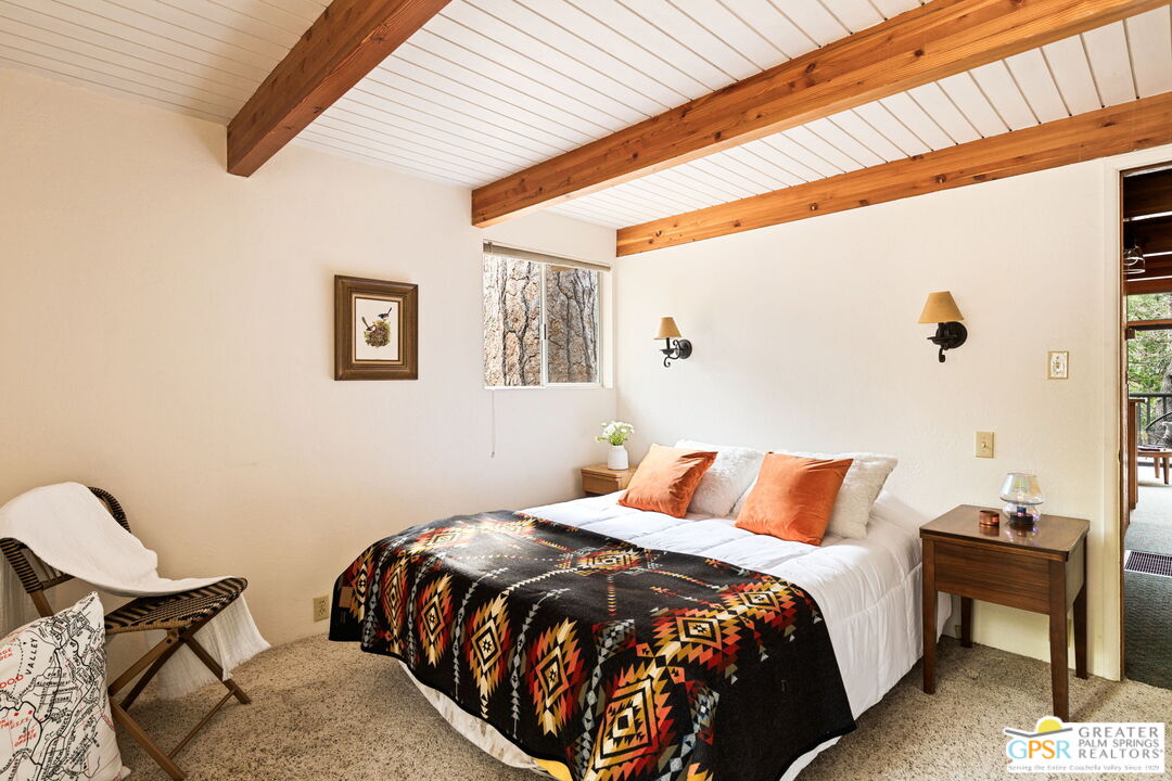 24601 Fern Valley Road Idyllwild, CA 92549 - Photo 34 of 50 a bedroom with bed and window