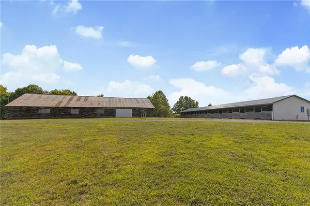 a view of a porch with a wooden fence