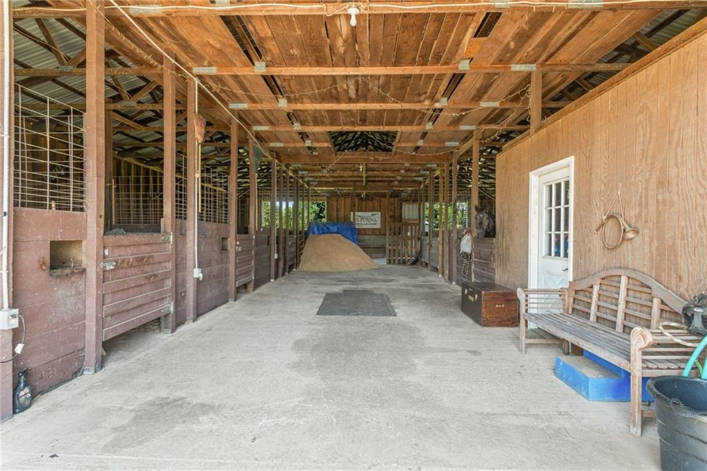 206 Lee Road Grove City, PA 16127 - Photo 17 of 45 a view of an empty room with wooden walls