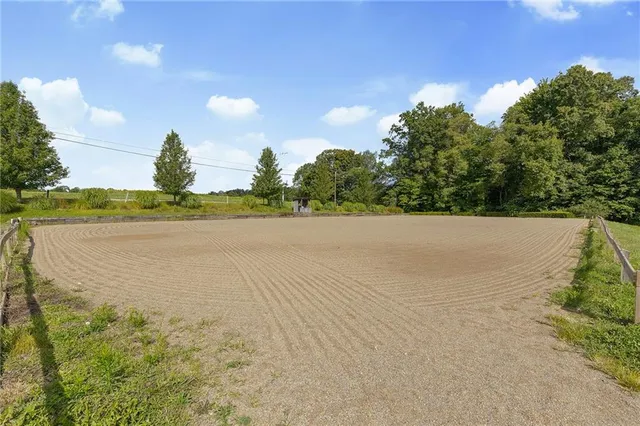 a view of an ocean and a yard