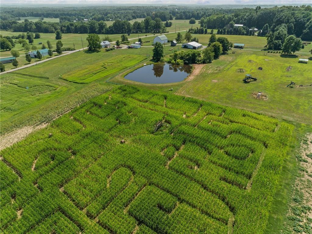 206 Lee Road Grove City, PA 16127 - Photo 6 of 45 a view of a golf course with a garden