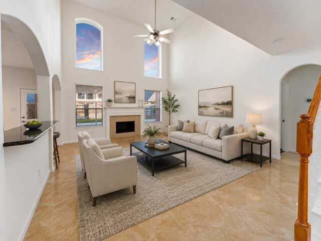 7226 VORGEN Court Spring, TX 77379 - Photo 3 of 43 a living room with furniture fireplace and a chandelier