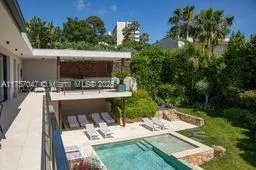 a view of yard with furniture