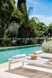 a view of a park and basketball court